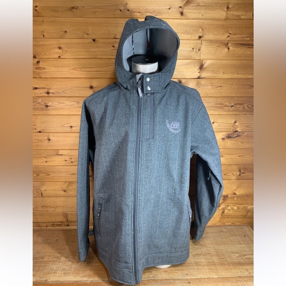 686 Men's Charcoal Performance Jacket 
100% polyester waterproof shell